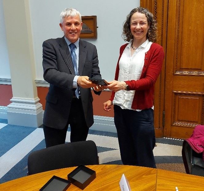 Faraday Division President Dwayne Heard presenting Claire Vallance with the Division President's Medal