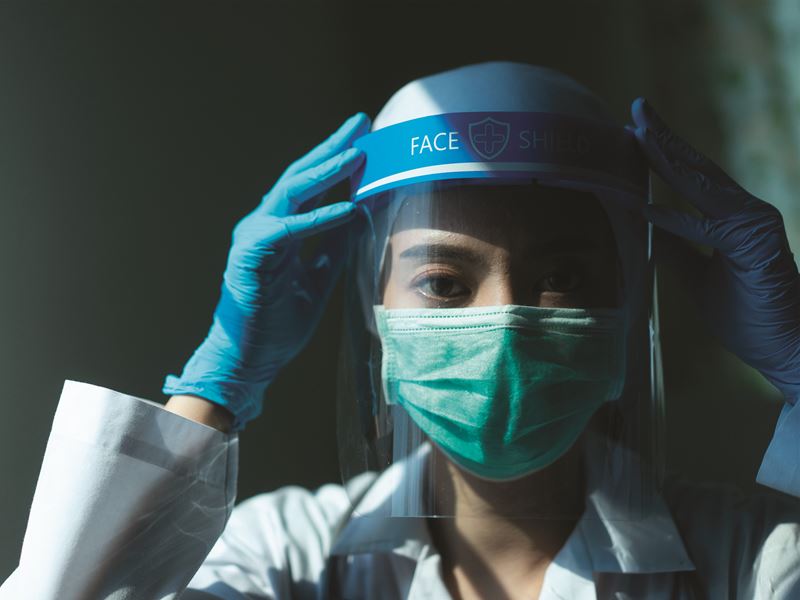 Image of a woman wearing a protective mask