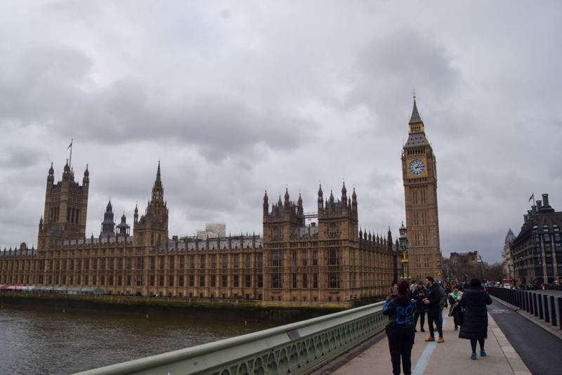 A general view of Big Ben, the Houses of Parliament and Westminster Bridge on a cloudy day.