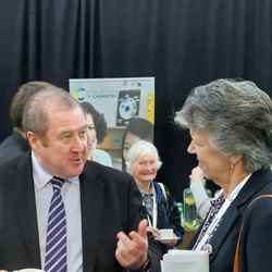 Graeme Dey MSP chats with Professor Gill Reid during a break at Science and the Parliament