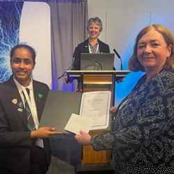 Professor Julie Fitzpatrick, Scotland's chief scientific adviser (pictured right), presents an award to one of the many science award winners commended at the Science and the Parliament event, while Prof Gill Reid smiles and watches on in the background