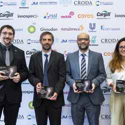 Left to right: Liam Dodd, from ThioTech; Professor Stuart Scott, of H2Upgrade and the University of Cambridge; Dr Othman Almusaimi, of Orthogonal Peptides and Imperial College London; and Layla Hosseini-Gerami, of Ignota Labs, stand smiling and facing the camera with their respective awards