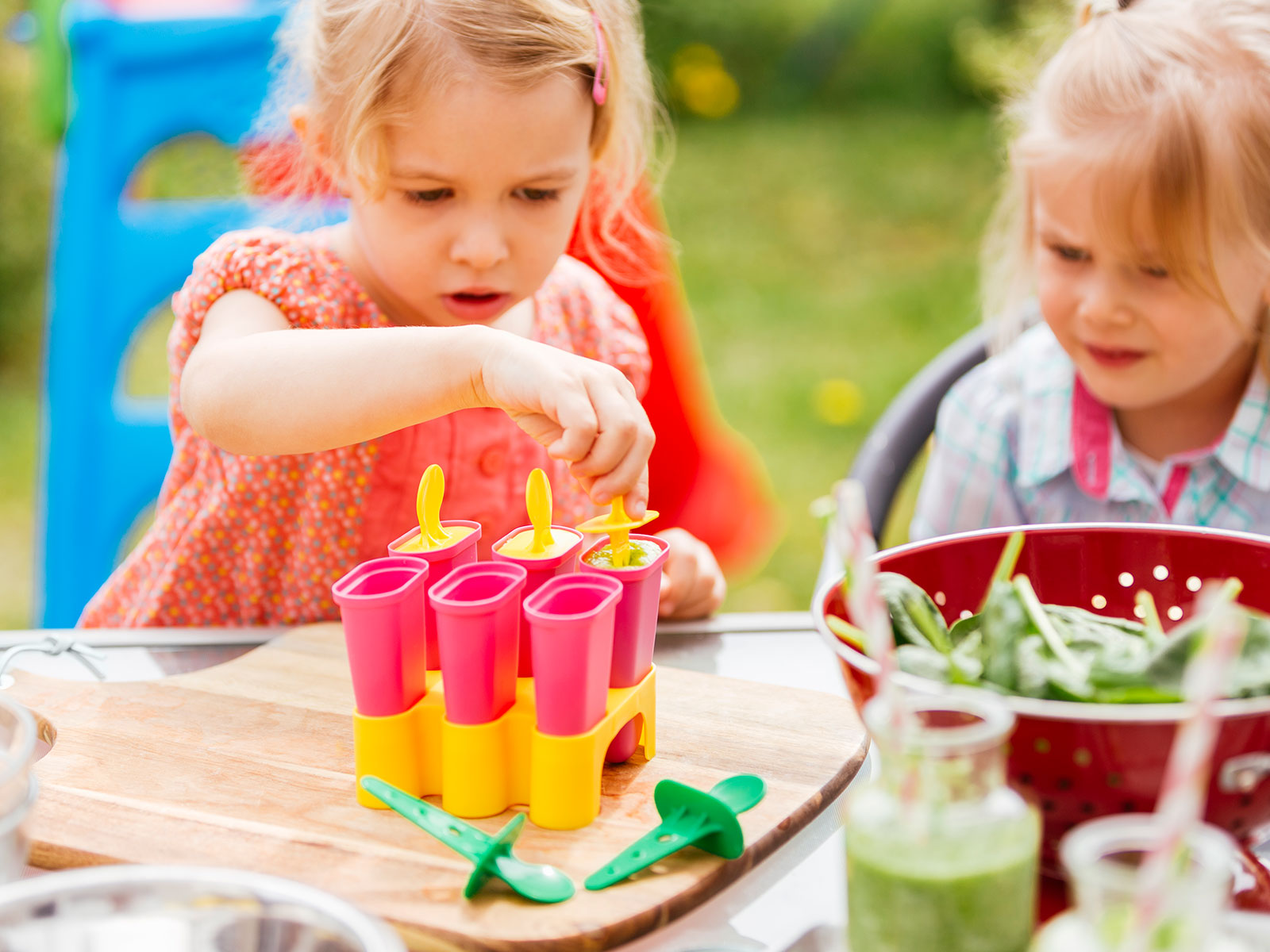 children playing with ice lollies