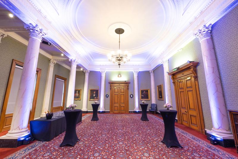 council room with purple lighting and drinks reception