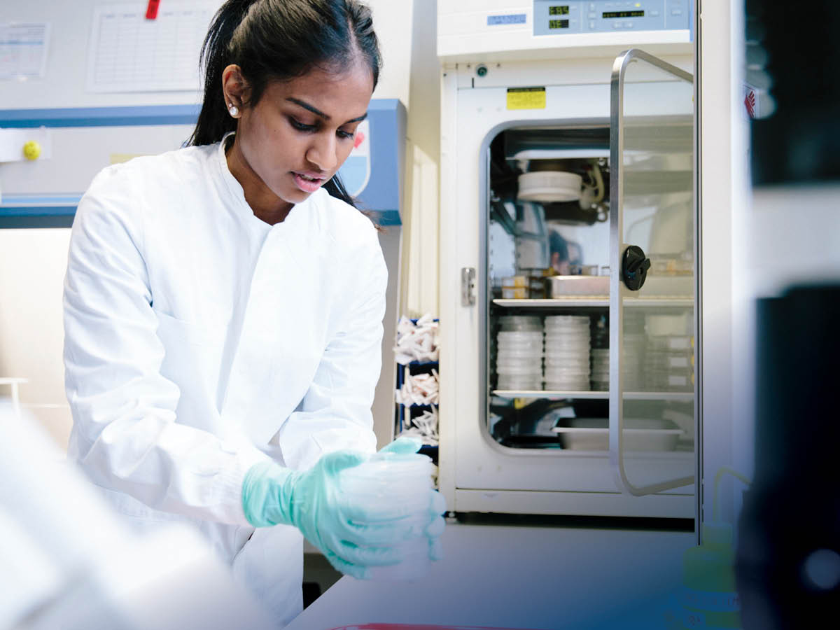 Indian female chemist in lab