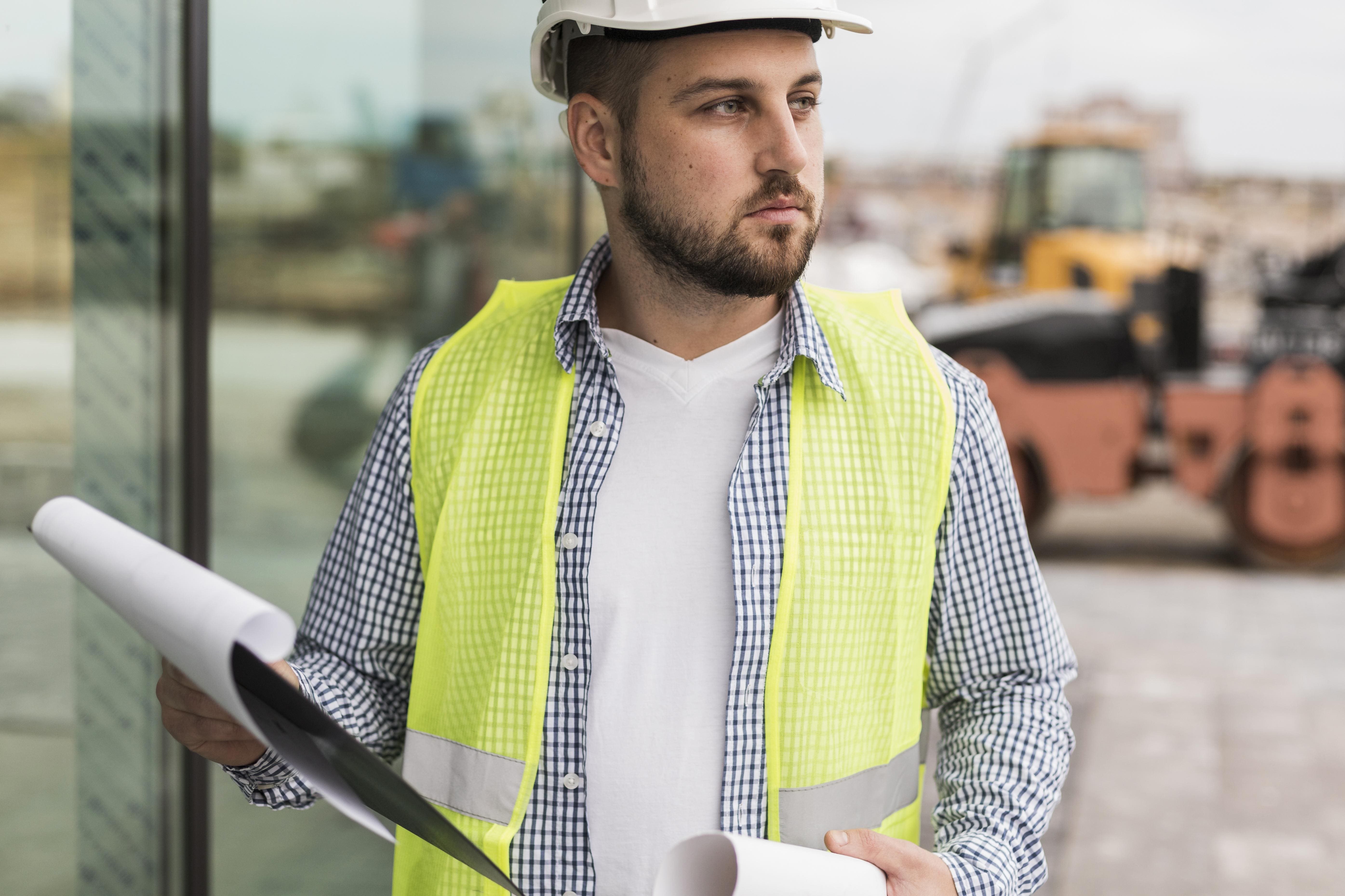 medium-shot-man-wearing-safety-vest.jpg